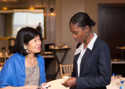 Anne Marie Boursiquot King, Senior Program Office at RIZE chats with Vivian Li at the Sharing Solutions—Massachusetts Opioids and the Workforce Program. Co-hosted by the US Chamber of Commerce Foundation, the Greater Boston Chamber of Commerce, and RIZE. September 2019