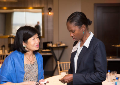 Anne Marie Boursiquot King, Senior Program Office at RIZE chats with Vivian Li at the Sharing Solutions—Massachusetts Opioids and the Workforce Program. Co-hosted by the US Chamber of Commerce Foundation, the Greater Boston Chamber of Commerce, and RIZE. September 2019