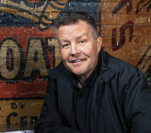 Photo of Ken Casey smiling