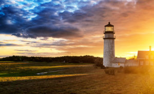 The Highland Lighthouse against a beautiful sunset in North Truro Massachusetts on the Cape Cod National Seashore