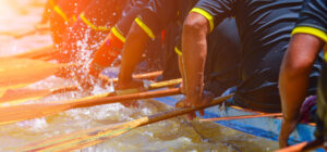 people rowing boat
